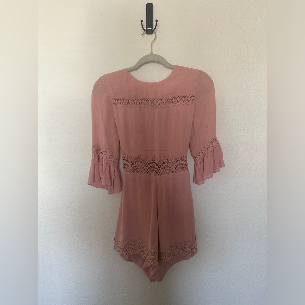 Romper with lace details.